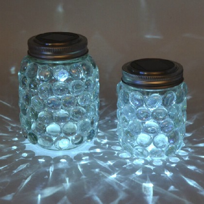 Mason jar luminaries are great for kids to make.