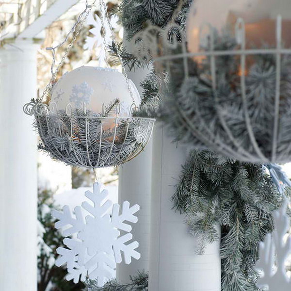 Elegant Hanging Baskets with Frosted Evergreen Branches and Sparkling Accents.