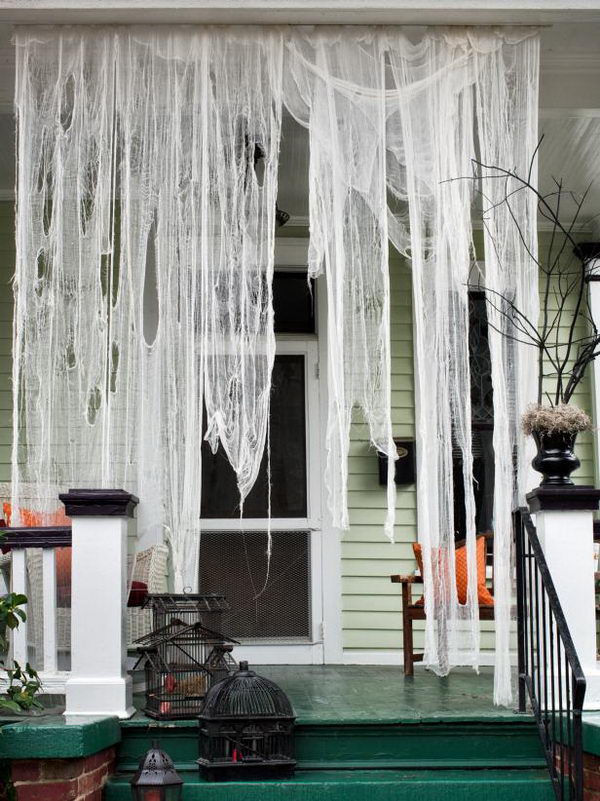 Spooktacular Front Porch With Drape Cheesecloth.