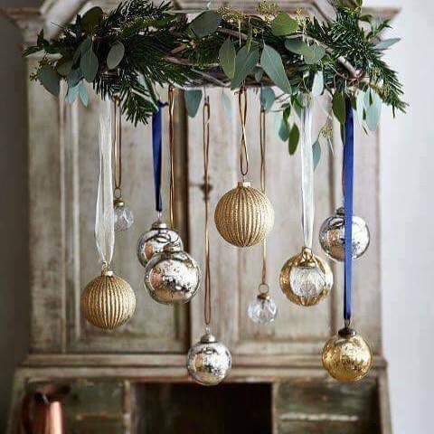 Love this chandelier dressed for Christmas.