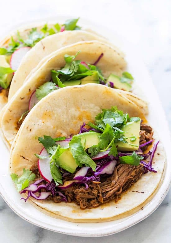Slow Cooker Mexican Pulled Pork Tacos.