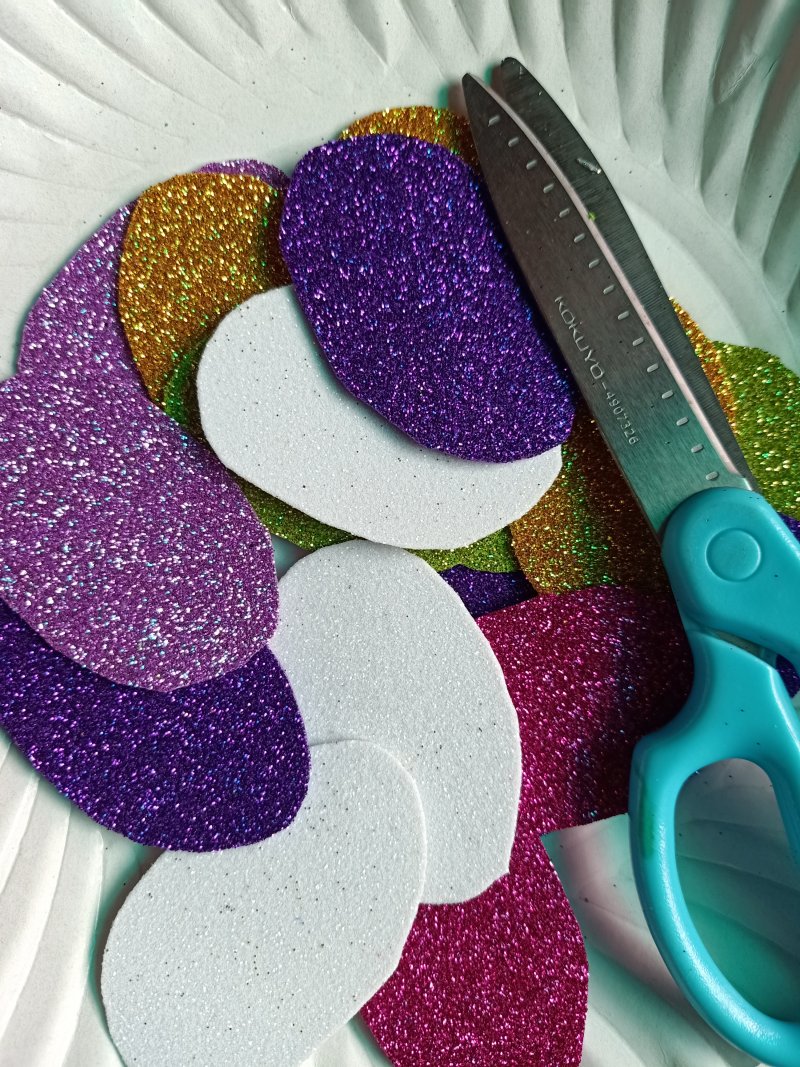 Easter eggs on your glitter papers