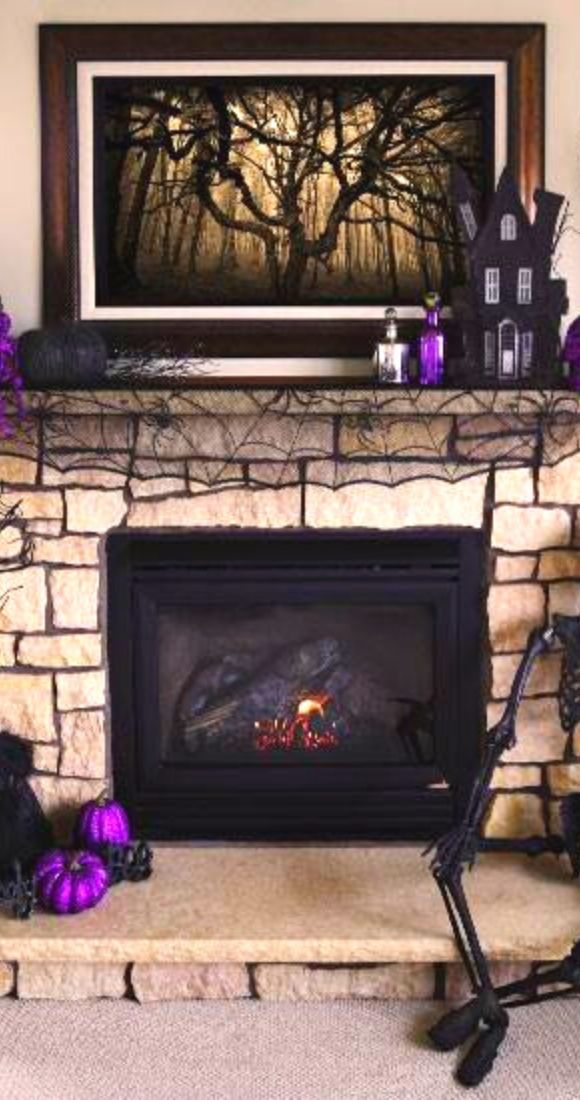 Cool purple and black Hallween mantel decor ideas.