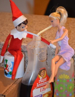 Elf and Barbie on a Date from Elf on the Shelf Ideas

