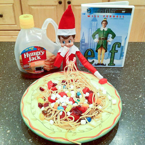 Elf on the Shelf eating sugary spaghetti