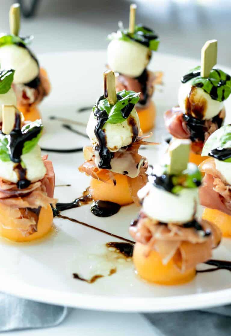 33 Best Toothpick Appetizers for a Party on a Budget 16 Prosciutto Melon & Mozzarella Skewers