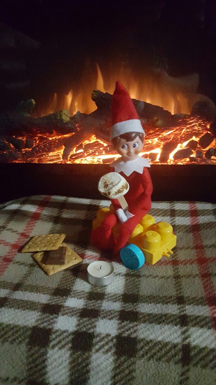 Elf making Smores