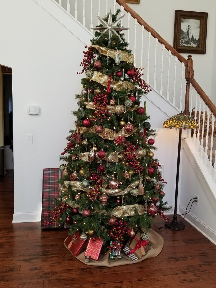 Red, green, gold ribbon Christmas tree.