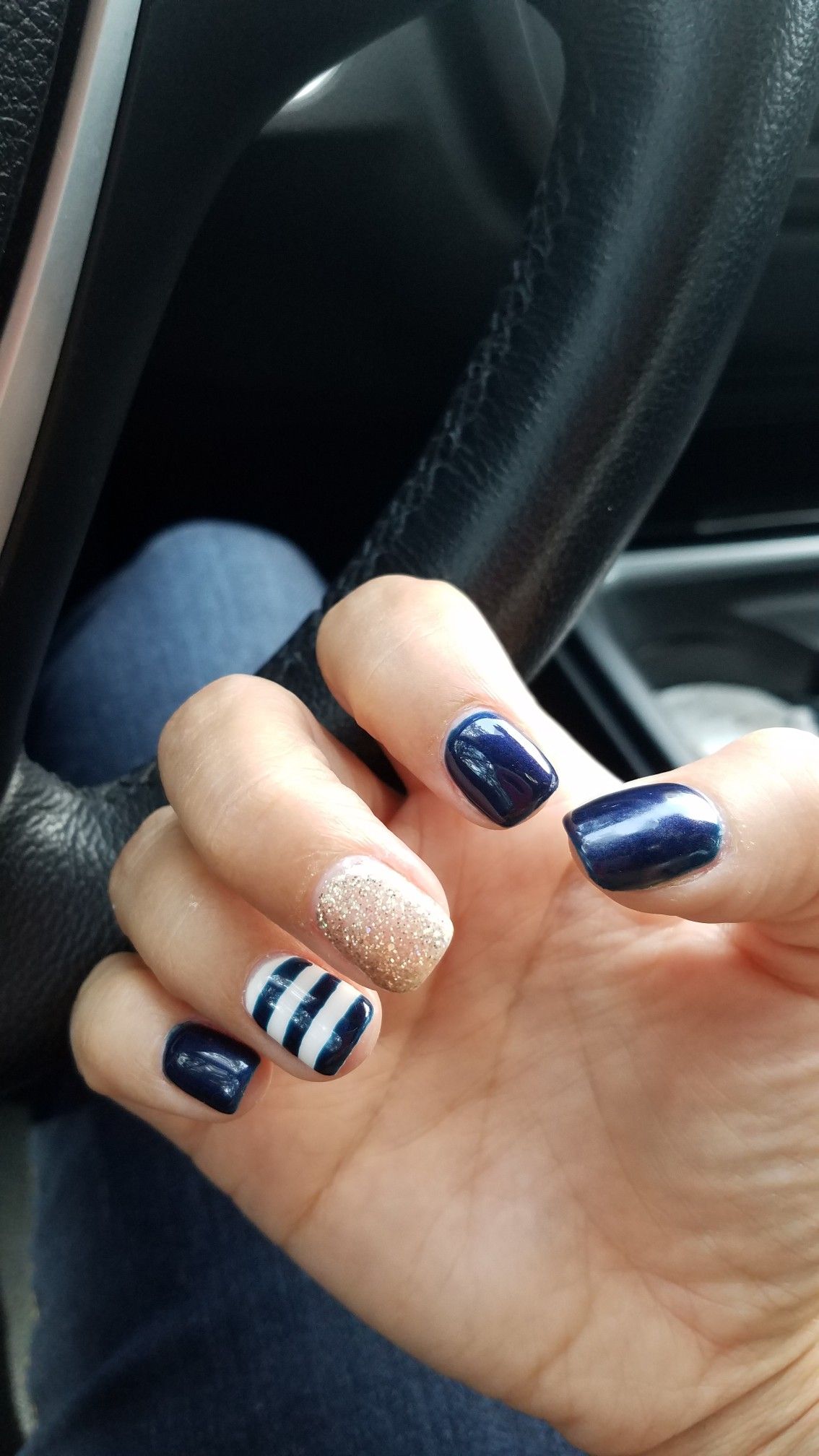 Navy, navy & white stripes and gold glitter.