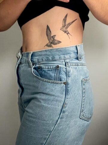 Delicate bird tattoo