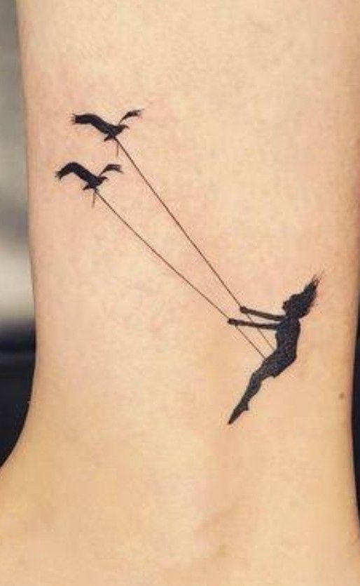 Girl Swinging Tattoo