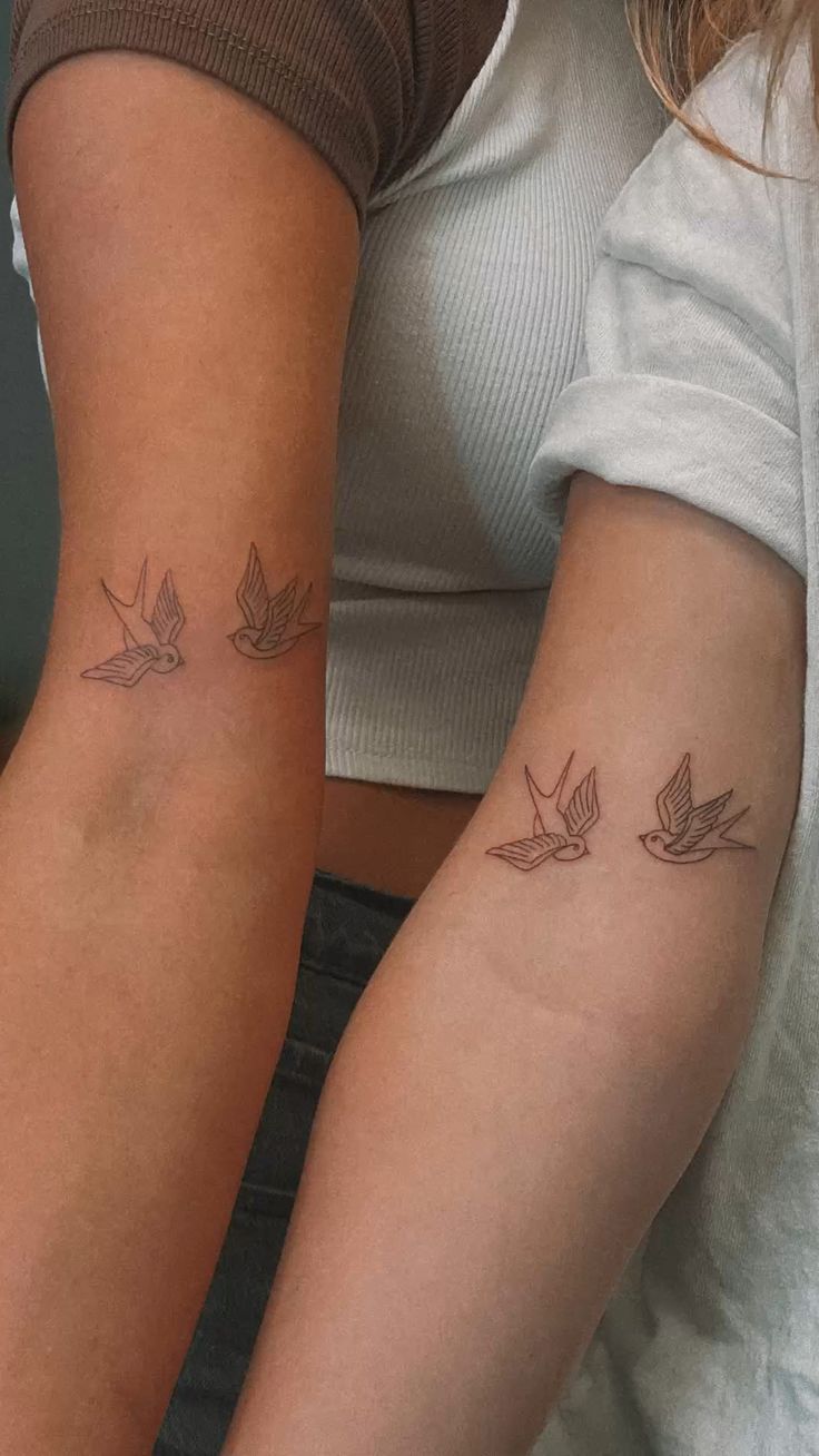 Matching minimal bird tattoo